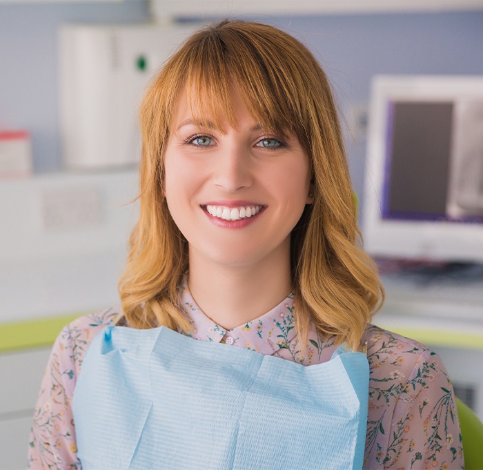 Smiling woman in dental chair