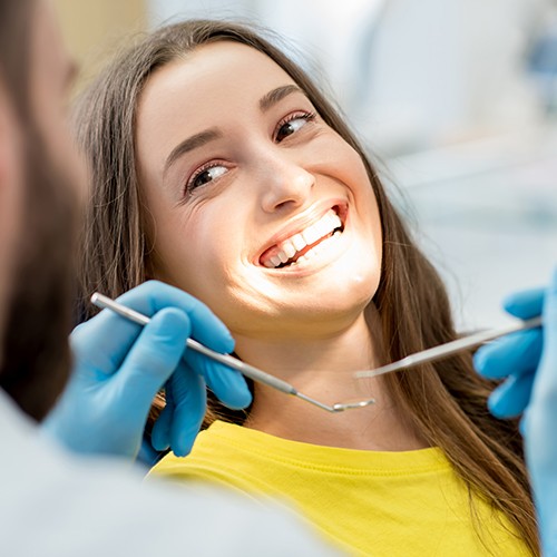 Woman smiling at dentist