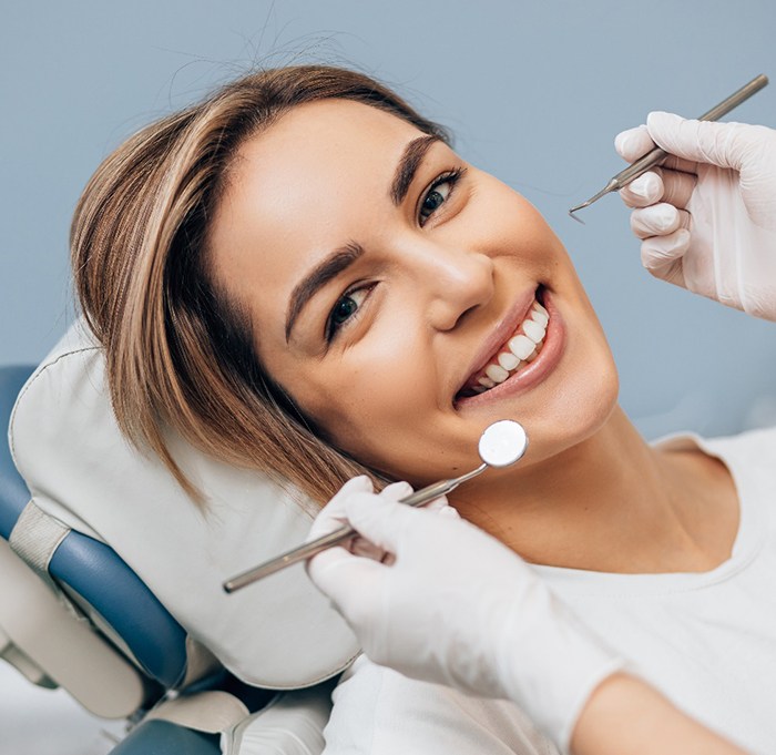 Woman smiling after cosmetic dental bonding in Indian Land