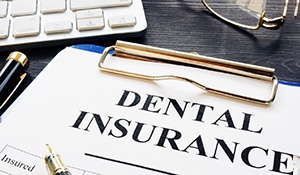 Dental insurance form lying on a table