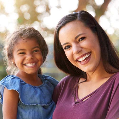 Woman and child after fluoride treatment in Indian Land 