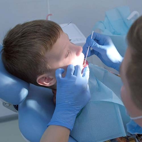 Child receiving fluoride in Indian Land 