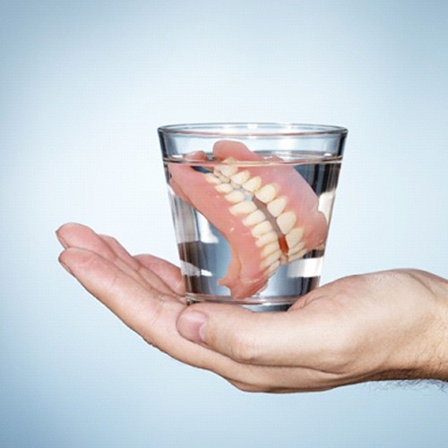 dentures in glass of water 
