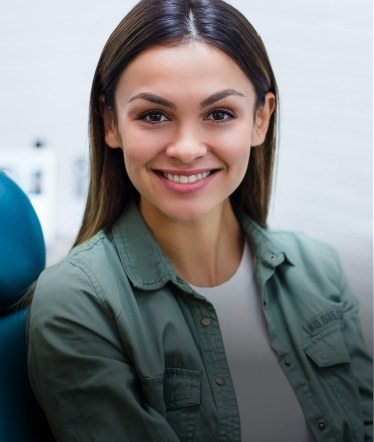 Smiling woman in dental chair