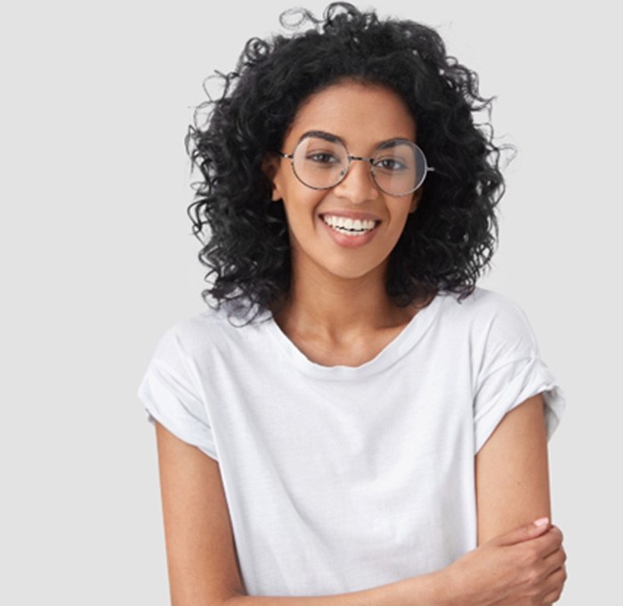 woman smiling after oral cancer screening in Indian Land