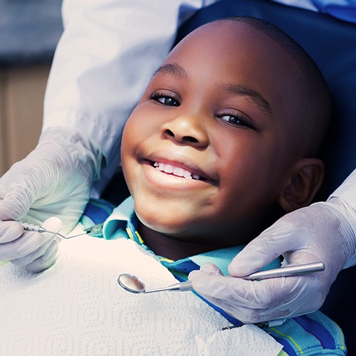 Smiling child in dental chair