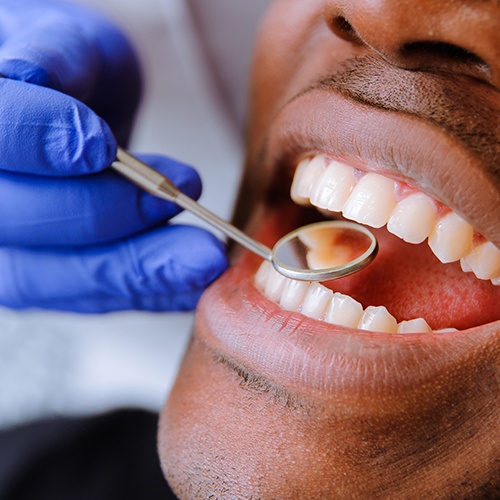 Man receiving dental exam