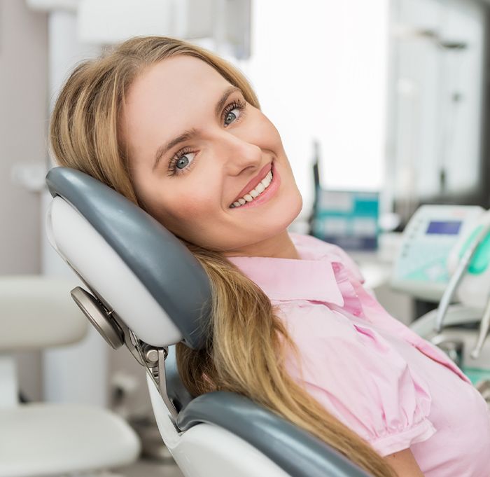 Smiling woman in dental chair