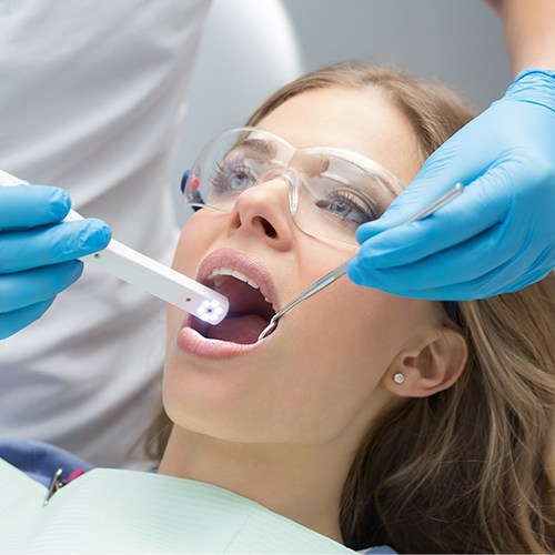 Dentist capturing intraoral images