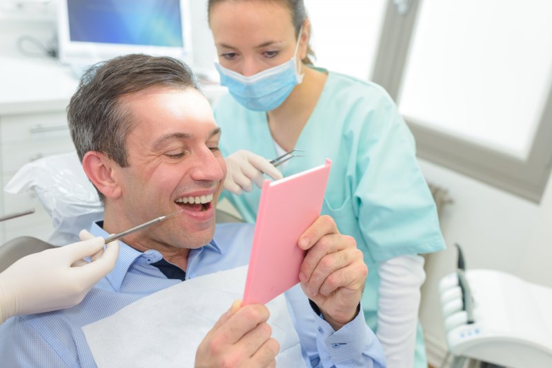 dentist explaining to patient 