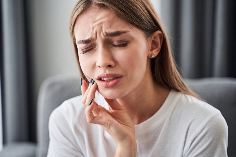 Woman with severe toothache
